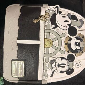 Loungefly Black and White Backpack with Gold Accents